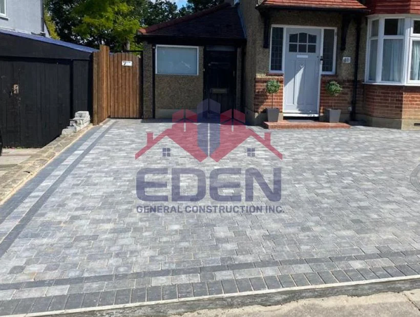 Driveway paver installation creating durable and decorative driveway surface