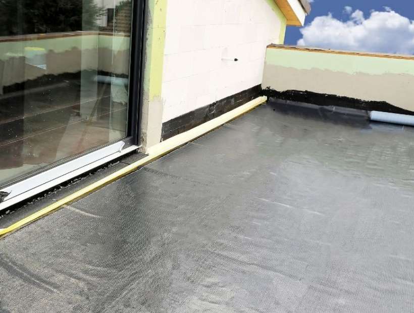 Roof waterproofing and masonry sealing project on New York City building