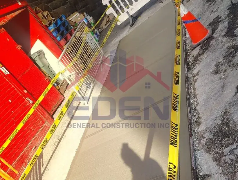 Chimney sidewalks repair in New York City with concrete crown and waterproof finish