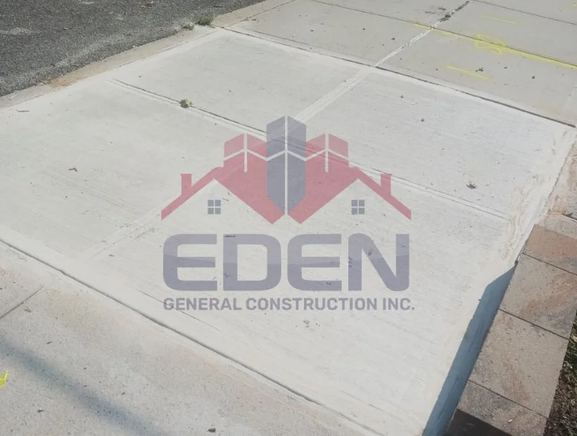 Exterior facade sidewalks repair on NYC building restoring brick and stucco surfaces